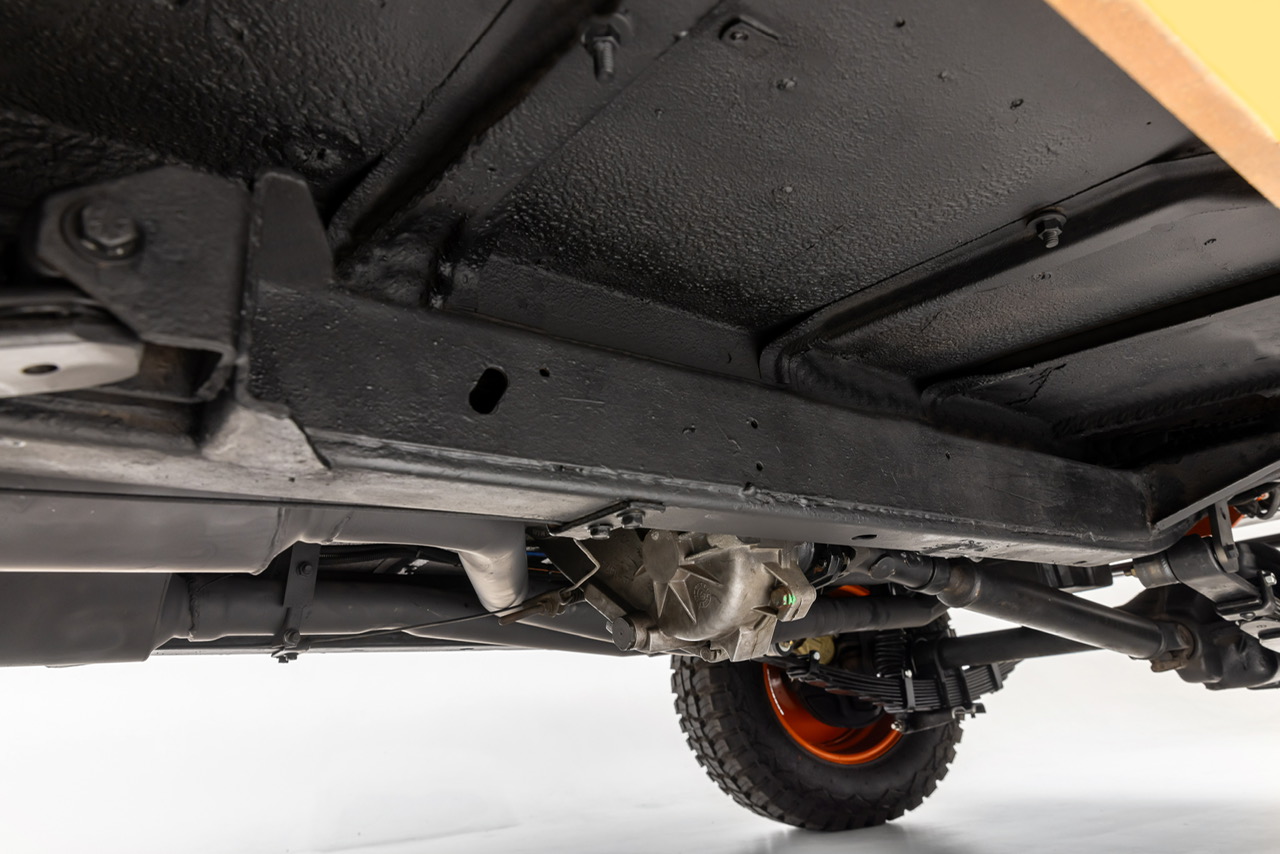 undercarriage view of an international scout showing the chassis, rear differential, leaf spring suspension scout club ca